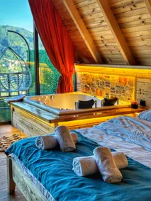 Suite bungalow with jacuzzi in the heart of nature - Image 2