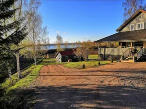 Kivelä's house with a lake landscape - Image 2