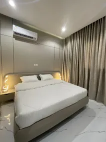 Elegant apartment with a balcony and a bedroom - Image 5