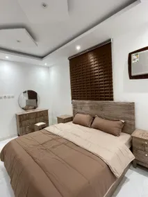 Furnished 6-bedroom apartment with two bedrooms, a living room, a lounge, two bathrooms, and a kitchen - Image 2