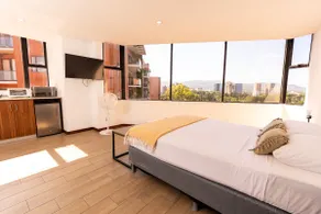 A beautiful private room with a view of the city - Image 4