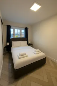 Comfy 2BR Apartment for Families in Bury - Image 3