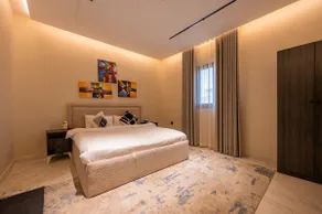 Modern & Cozy 2BR Stay in Al Rawdah - Image 5