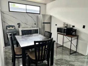 Modern Apt 5 min airport with A/C and parking - Image 4