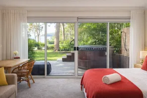 Garden Escape with Hot Tub and Stunning Water View - Image 3