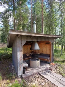 Cabin with traditional sauna by a small creek - Image 5