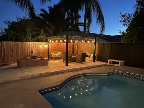 Split-level NW Bakersfield Home with Outdoor Oasis - Image 4