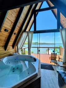 Chalet with Jacuzzi, Pool and View/Edge of the Lagoon - Image 3