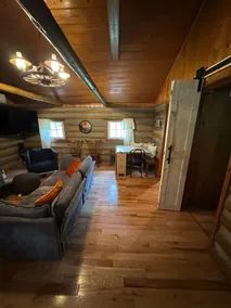 Rustic log cabin on the river - Image 4