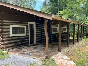 Rustic log cabin on the river - Image 2