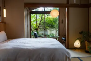 Alone in nature | Kusumoto, a private rental inn nestled at the foot of a mountain in a national park and surrounded by plants - Image 2