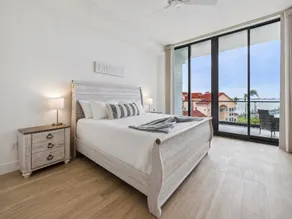 Sleek Coastal Condo with Stunning Riverfront Views and Luxury Amenities - Image 5