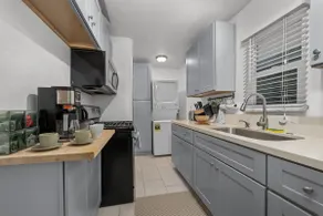 Eclectic 1BR Home Central SD | Kitchen & Parking - Image 5