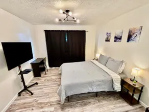 Bed & Bath, 4K 60” TV, Kitchenette Apt (A1) - Image 3