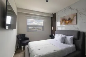 Near Stadium | A/C + TVs in Every Room - Image 2