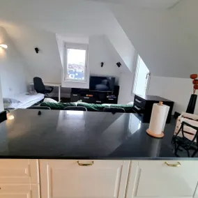 Cozy attic with city view - Image 5