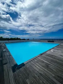 Studio Pool & Gym Access - Near Airport & PPT - Image 2