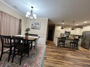Rare Find! 4BR/3BA Farmhouse minutes from Outlets - Image 3