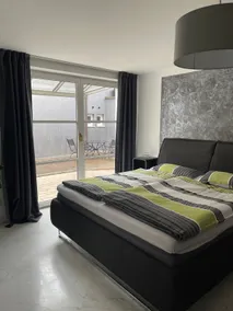 Cozy apartment with a patio - Image 4