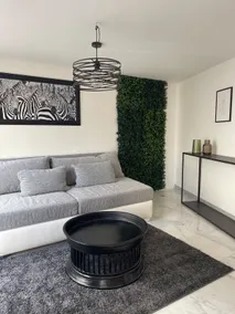 Cozy apartment with a patio - Image 3