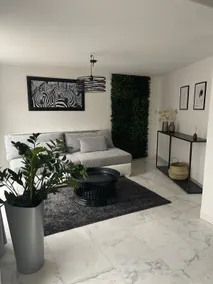 Cozy apartment with a patio - Image 2
