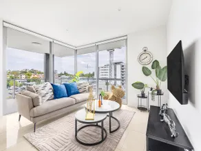 Modern 3BR Riverside APT w Parking near Shops and Park - Image 2