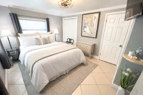 Private Tampa Suite • Patio Lounge • Queen Bed - Image 2