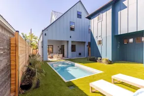 Modern Haven: Central Brand New Home w Heated Pool - Image 3