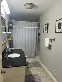 Spacious Two Bedroom Upper Unit with Kitchen - Image 4