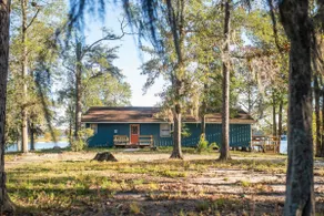 Waterfront Lake Retreat • Private Dock & Fire Pit - Image 3