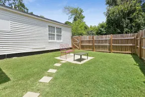 Walk to SFA | 3BR Home with Private Yard - Image 3