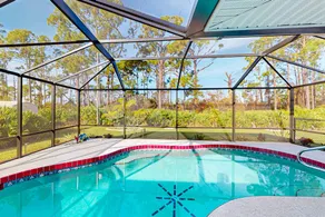 Cozy Pool Home with Lanai, AC & Laundry - Image 4