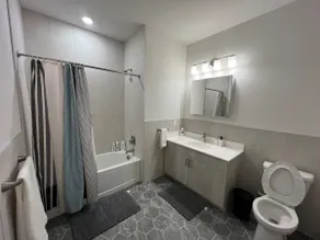 212 Modern 1BR | 2-Min Walk to Train |Free Parking - Image 5