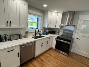 Bright 2BR Retreat w/ Private Fenced Backyard - Image 4