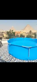 Artistic Home 5Min Walk Pyramids with Rooftop View - Image 3