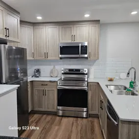 1BR Above Ground Garden Suite + Private Parking - Image 5