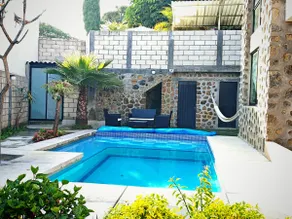 A house with a heated pool - Image 2