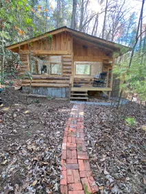 *The Moon and You* Creekside Off Grid Glass Cabin - Image 3