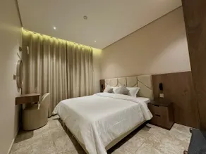 Luxurious hotel suite with a modern and comfortable design - Image 2