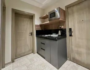 Luxurious hotel suite with a modern and comfortable design - Image 4