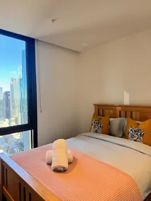 Spacious 70sqm CBD Apt · Skyline Views + Parking - Image 5