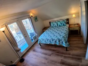 A bedroom balcony with a view to the Ocean.  7 min walk to the beach - Image 2