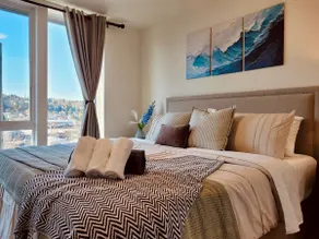 Luxe & Bright | Rooftop Views & A/C | Free Parking - Image 5