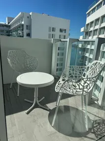 Elegant Corner 1BR Apartment with Balcony + Pool - Image 4