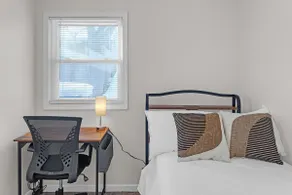 Near MSU • Elevated Deck • 65” TV • Pets. Book Now - Image 4