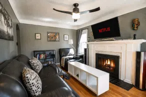 Pretty Art and Reclining Couches - Image 2