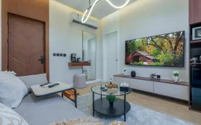 One bedroom and a living room with a modern design - Image 4