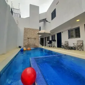 Mini Suite 4 – Loft with Private Bathroom, TV, A/C, Pool - Image 4