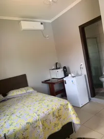 Pousada Gabriela, Room with a bed 1 - Image 4