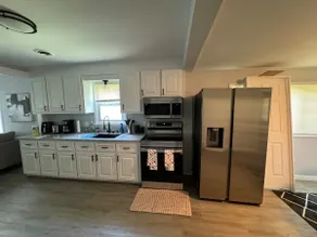 A Cozy Green Family Stay! - Image 3